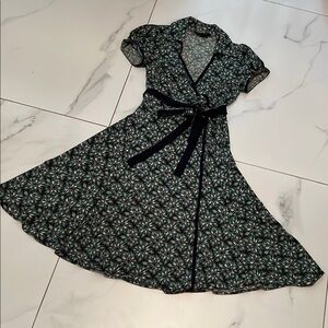 BCBGMaxAzria Wraparound Midi Dress in Navy, Sage, Gray & Cream Fireworks print.